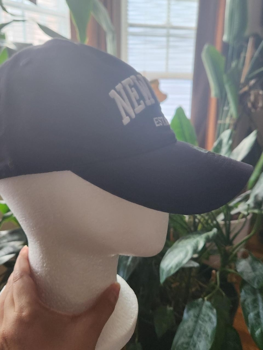 Black Baseball Cap with White 'NEW' Embroidery